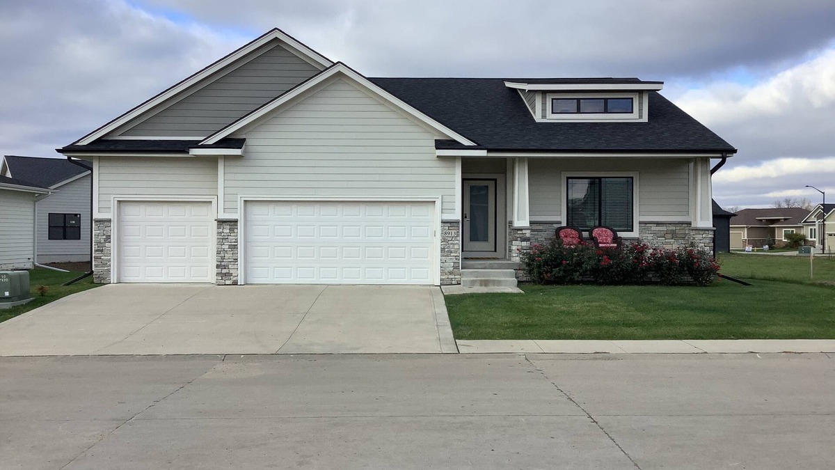 Johnston Villa | Farmhouse style Villa with front porch, 4 bedroom, 3 baths, and 2 living areas
