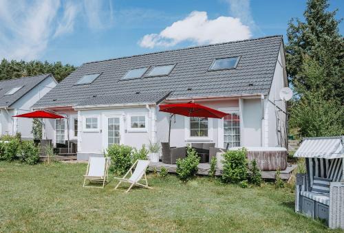 Luetow House | Ferienhäuser Insel Usedom Haus Jojo 7 - Blick aufs Achterwasser! Whirlpool und Sauna