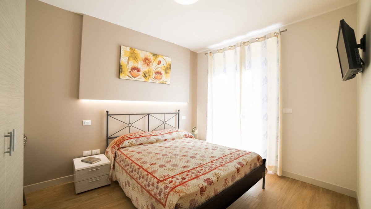 Cupra Marittima Apartment | Finely furnished apartment a stone's throw from the sea with swimming pool, gym, WiFi