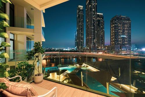 Mirdif Apartment | FIRST CLASS 2BR Luxury Canal & Pool Views