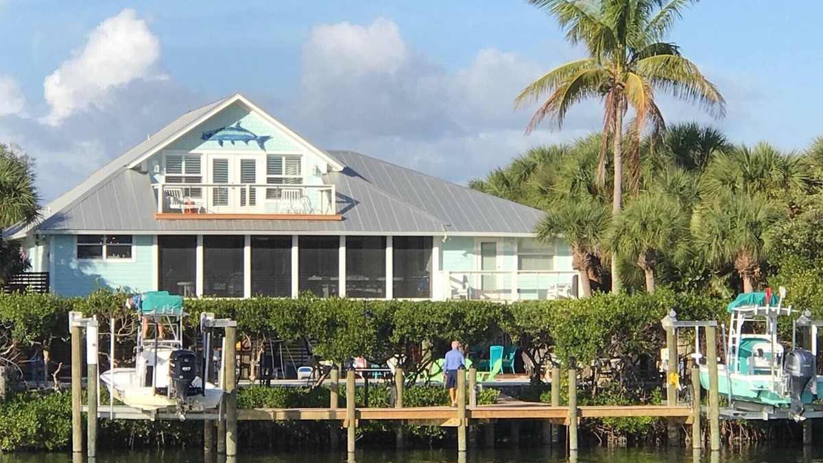 Palm Island House | Florida Island paradise! Pool, Dock, poolside bar and TV. Close to beach.