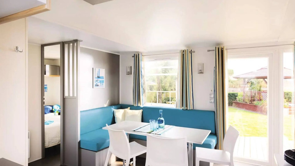 Treignac House | Flower Camping La Plage * - Mobil home Comfort 31m2 (3 bedrooms) + TV + semi-covered terrace of 18 m2 8 people