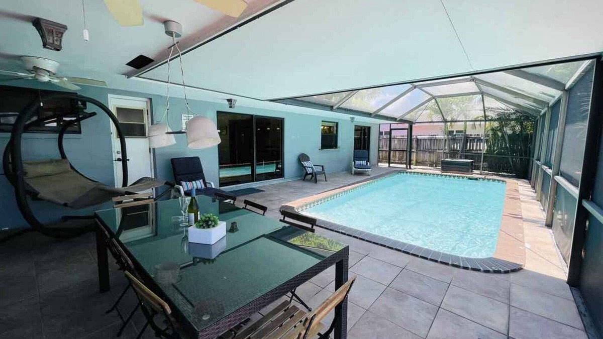 Coral Ridge Isles House | Fort Lauderdale 4/2 with screened-in pool and dock.