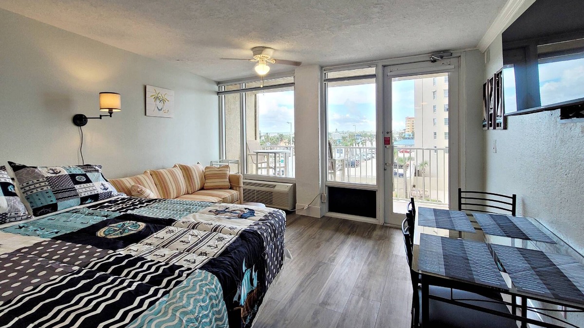 Daytona Beach Shores Condo | FREE DAILY ACTIVITIES! Corner Unit w/Private Balcony to Catch the Action Overlooking City & Ocean!