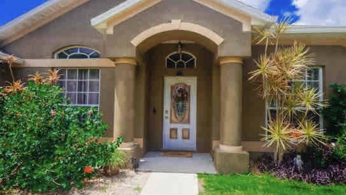 Port Saint John House | Fun for families, lots of room, private backyard oasis with heated pool.