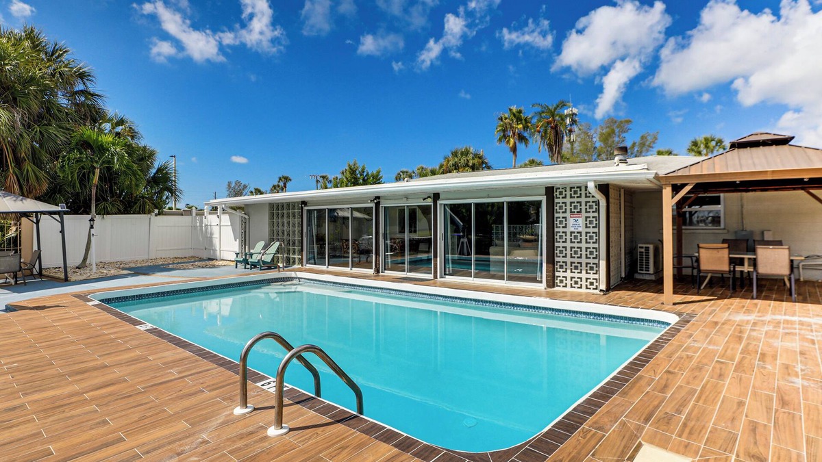 Whitney Beach House | Furnished Sunroom w/TV! Canal-Front Bradenton Gem