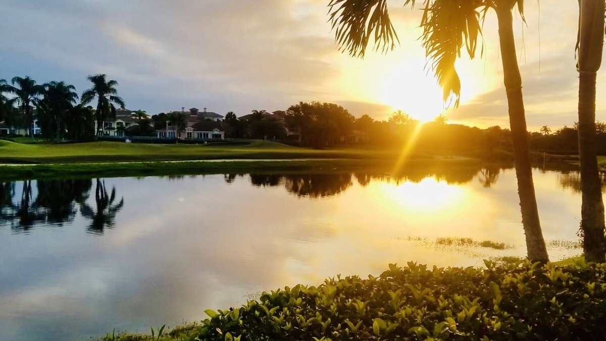 St. David's Island House | Gated Grand Harbor Townhome with beautiful views of the golf course and water