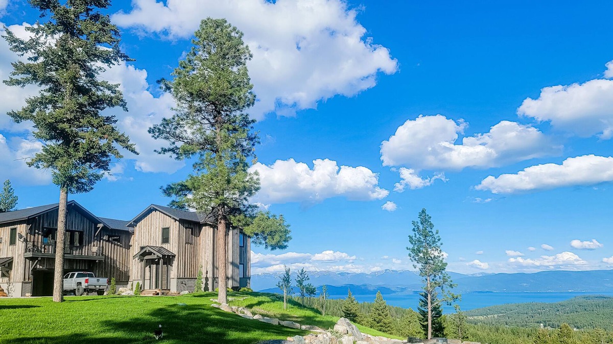 Lakeside House | Gorgeous lake-view cabin with game room & fireplaces - near Blacktail Mountain