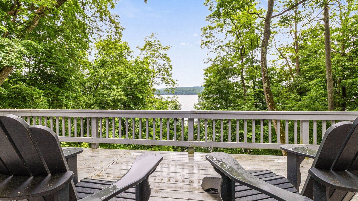 North Lake George House | Gorgeous lakeview retreat with wraparound porch, wood stove, & WiFi - dogs OK