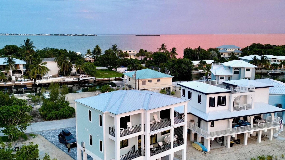 Cudjoe Gardens House | Gorgeous new build on Cudjoe Marina Basin with 80 ft boat dock and private pool