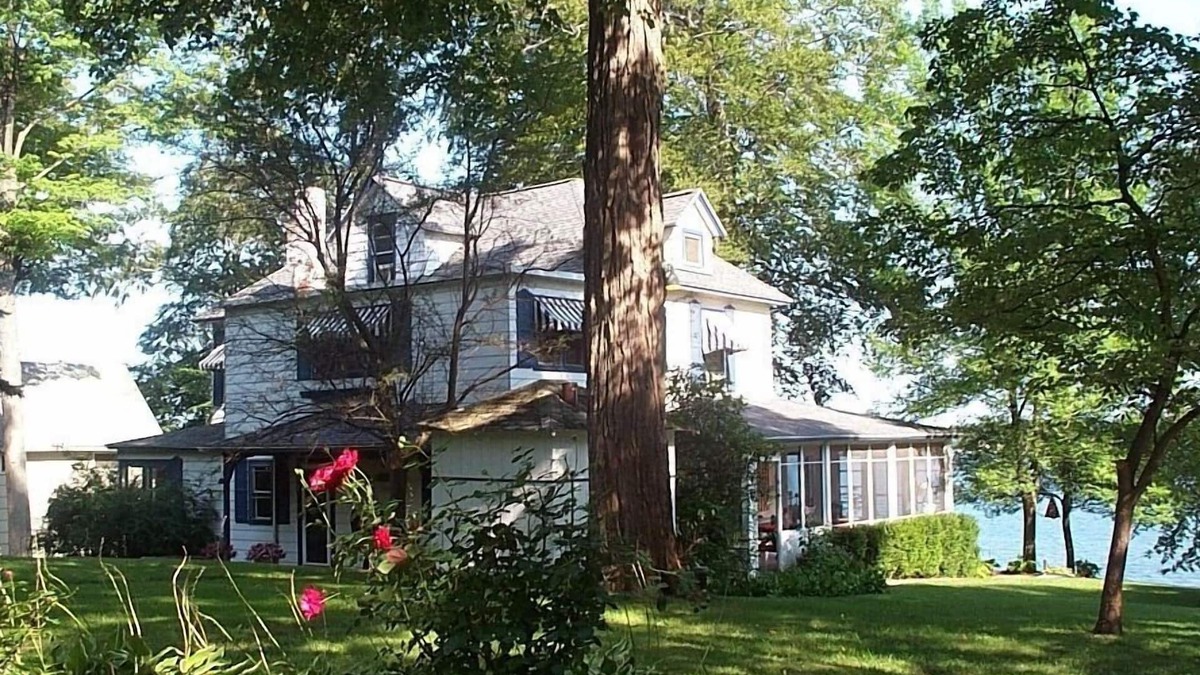 Paw Paw Lake House | Gorgeous Sandy Beachfront Paw Paw lake home with 155 ft. of frontage and dock