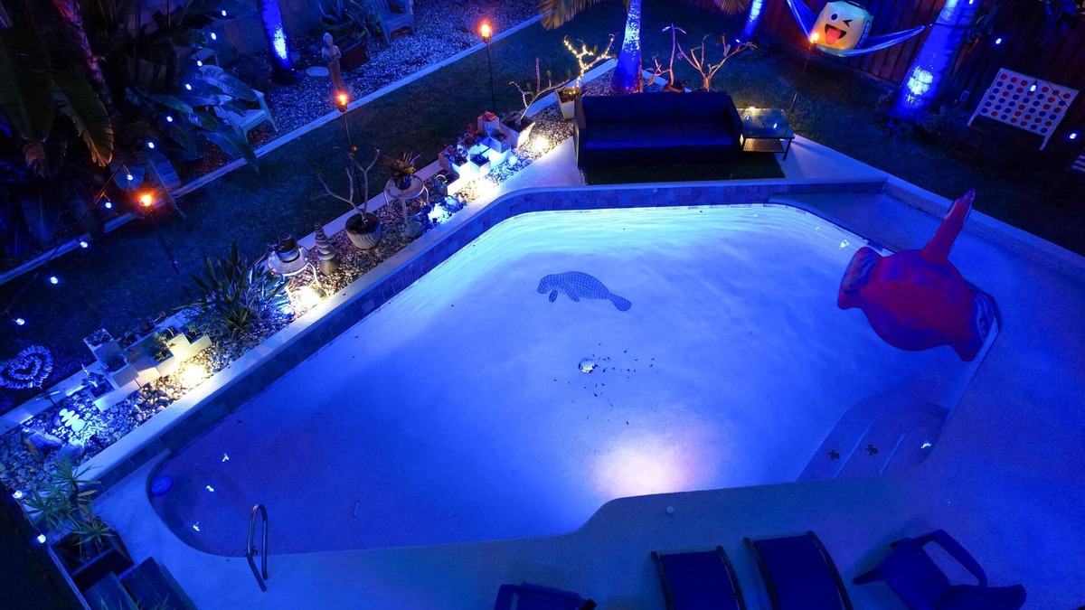 Tropic House | Gorgeous Urban Oasis W/hot Tub, Heated Pool And Private Movie Theater 3 Bedroom Home by RedAwning