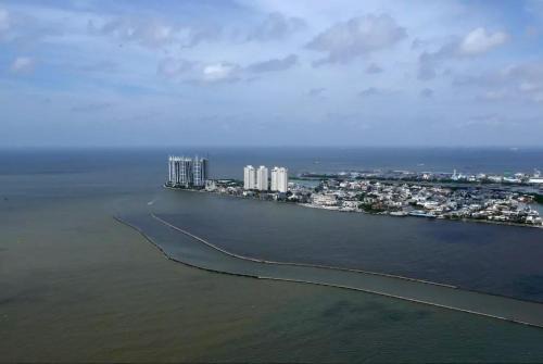 Pluit Apartment | Green Bay Condominium by Kevin