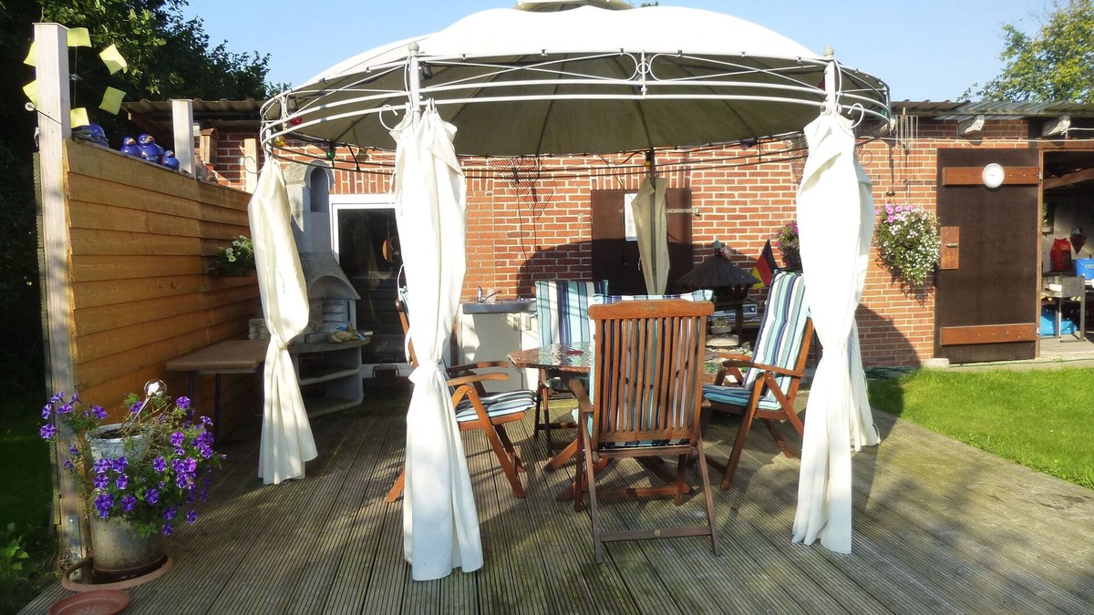 Erfde Apartment | Ground floor apartment with sun terrace - Ferienwohnung Stöterau