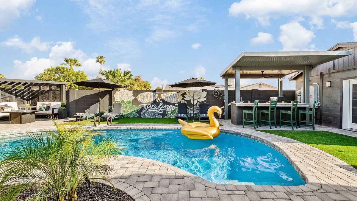 New Papago Parkway House | Group Fun HQ with Hot Tub + Bar, Heated Pool, Game Room & Lounge Near Old Town