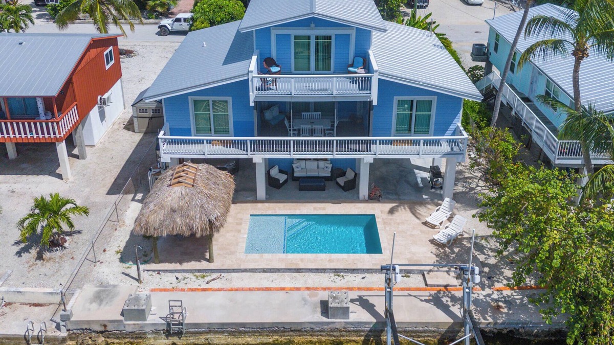 Cutthroat Harbor Estates House | Group Therapy Waterfront Keys Home – Pool, Tiki Hut, Dockage, & Monthly Rentals