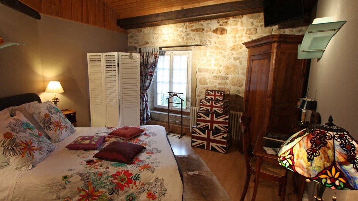 Aydoilles Bed & Breakfast | Guest room with private bathroom in a historic Priory