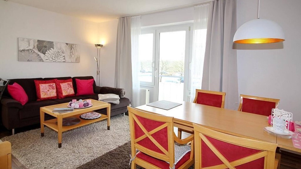 Schillig Apartment | Hübsche Ferienwohnung am Meer mit Balkon und Blick zum Grünen Nordseedeich