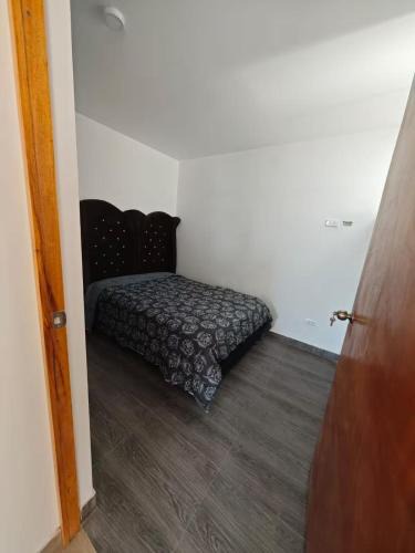 Atico House | Habitacion con Cochera