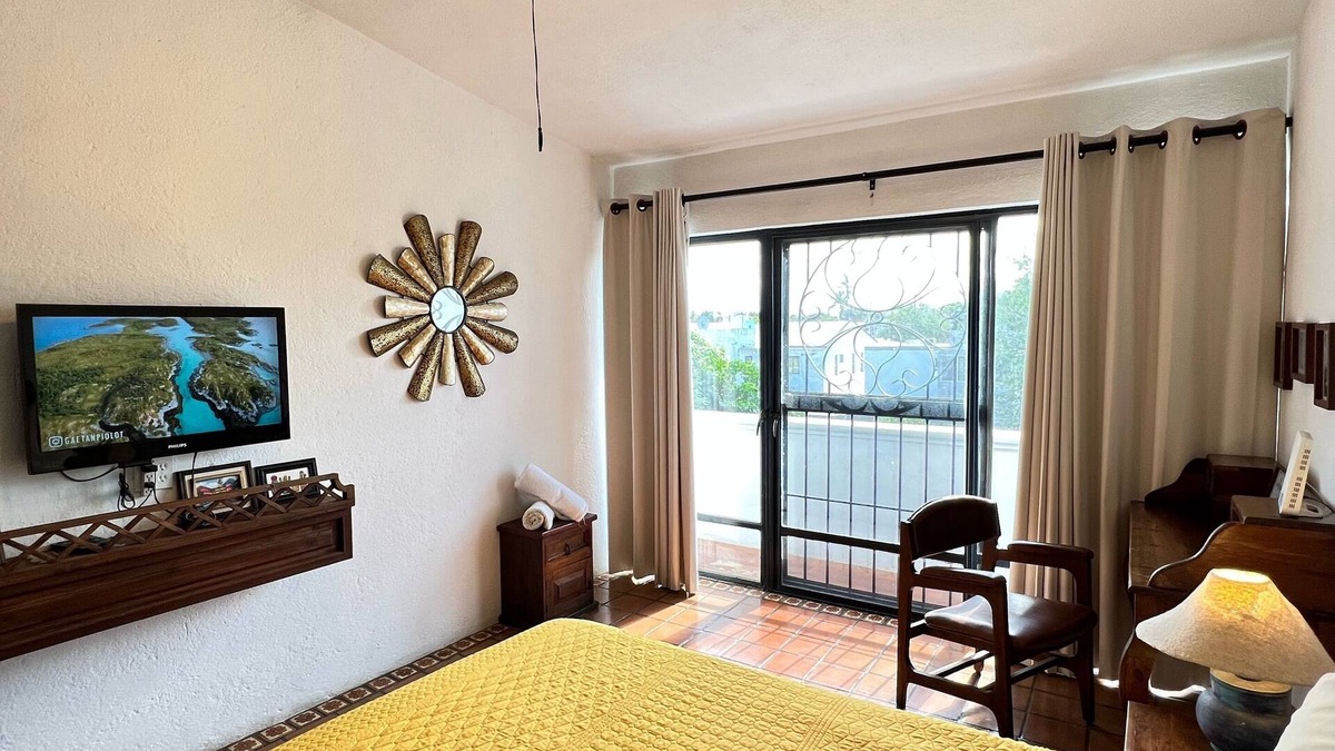 Las Garzas Apartment | Hacienda style home w/Rooftop, Pool & Sea View