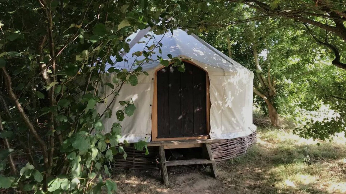 Ash Cabin | Handcrafted Grain Store Yurt in Somerset woodland; off-grid relaxation, campfire