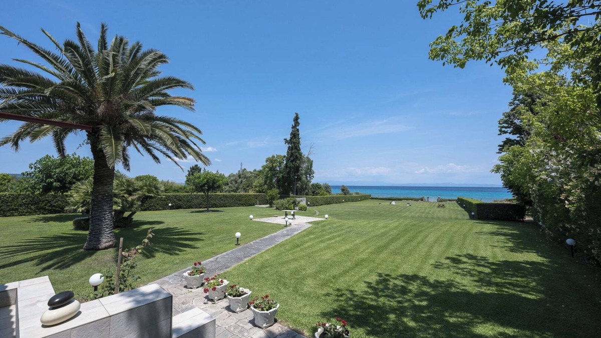 Polichrono Villa | Hanioti Beachfront Paradise Villa by Luxlikehome