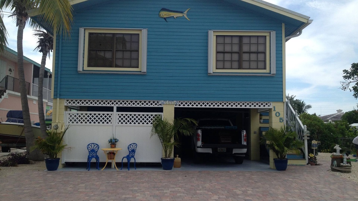 Long Key House | Happy "Key-z " canal-front home w/Tiki hut- RV storage available.