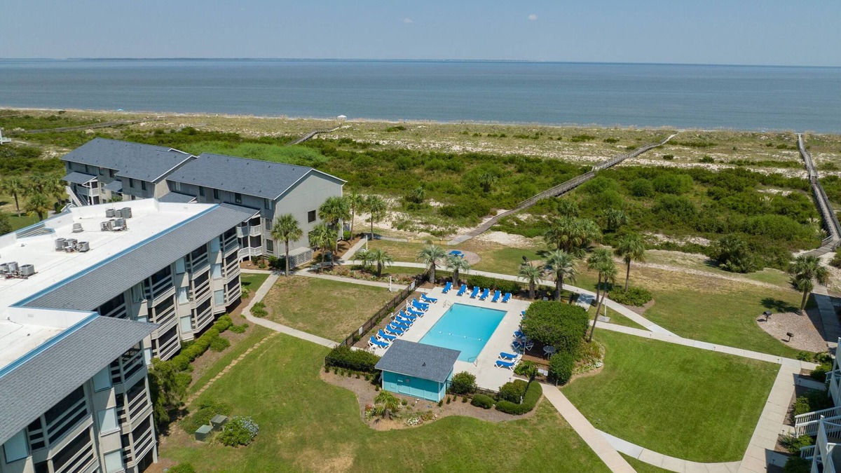 Oceanmarsh Subdivision Condo | Harbor Island Bliss: 2BR Condo, Beach Access, Resort Pool, & Stunning Views!