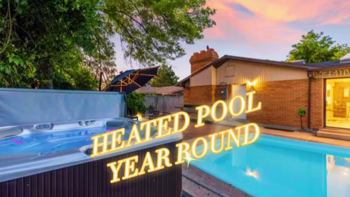 West Valley City House | Heated Pool & Hot Tub open all year with King Beds, Bar & Much More