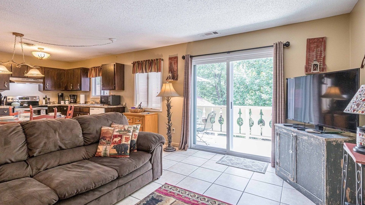 Helen Condo | Helen Riverfront 1BR 2BA Condo | Balcony Overlooking River | Downtown Helen