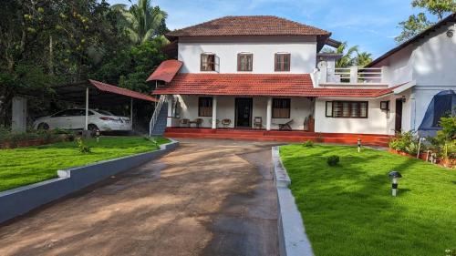 Kannur Bed & Breakfast | HILL TOP HOMES