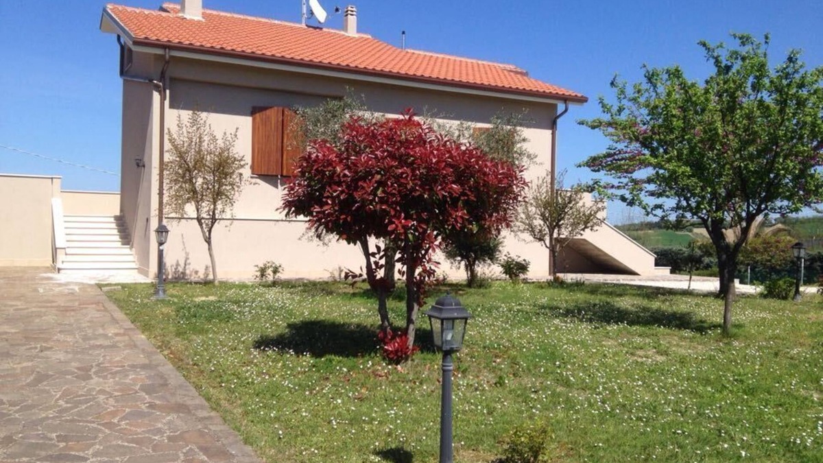 Tavullia House | Hillside villa with sea view
