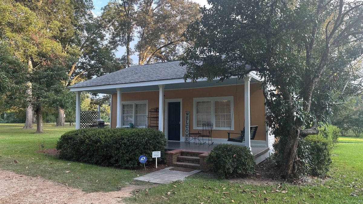 Natchez Cottage | Historic cottage privately situated on the grounds of the Foster Mounds.