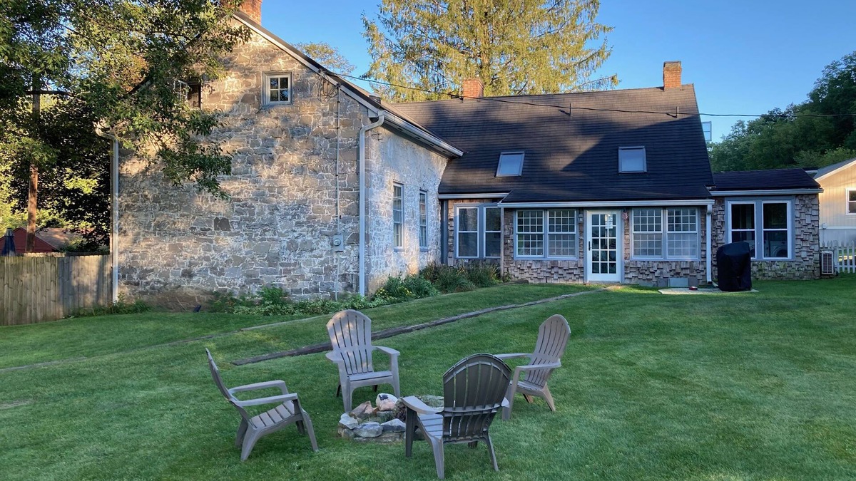 Calvin House | Historic stone farmhouse with rail trail and river access