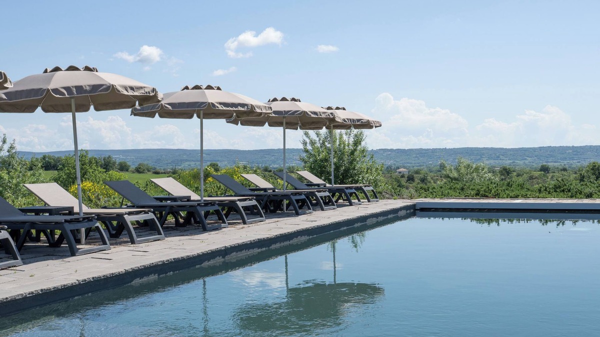 Saint-Sauveur-de-Cruzieres House | Holiday Home 'Gîte Figuier Au Mas Dujau' with Mountain View, Shared Pool and Wi-Fi