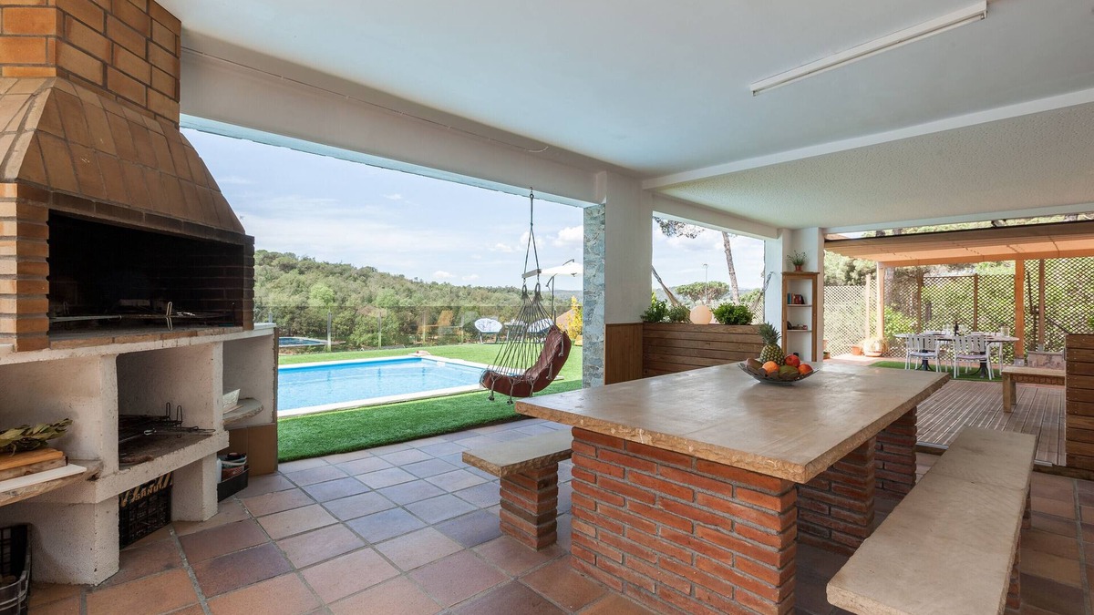 Llinars del Valles Apartment | Holiday Apartment "Armonia Estudio, Comparte Exterior" with Mountain View, Shared Pool & Wi-Fi