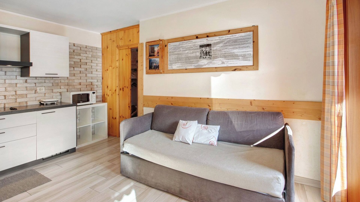 San Rocco Apartment | Holiday Apartment 'Baita Doss' with Mountain View, Balconies & Wi-Fi