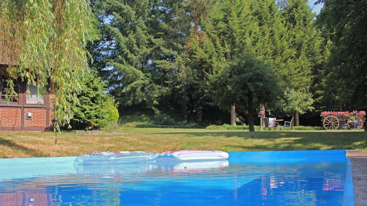 Kirchdorf House | Holiday Home in Kirchdorf with Swimming Pool,Terrace, Garden