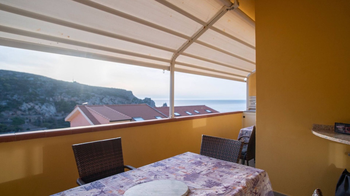 Buggerru House | Holiday Home 'Sole E Mare Buggerru - Appartamento' with Sea View, Private Terrace and Air Conditioning