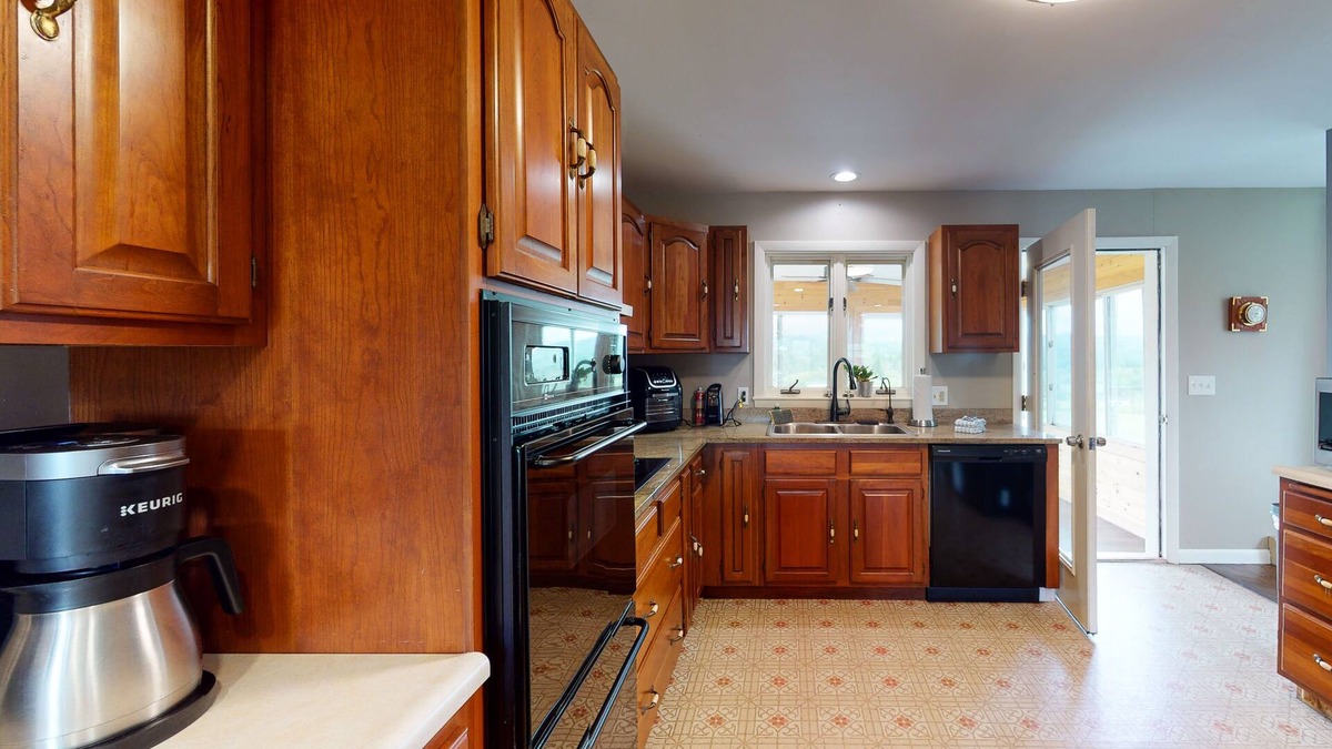 South Burlington House | Home with mountain views, large yard, fire pit, deck & 3-season room