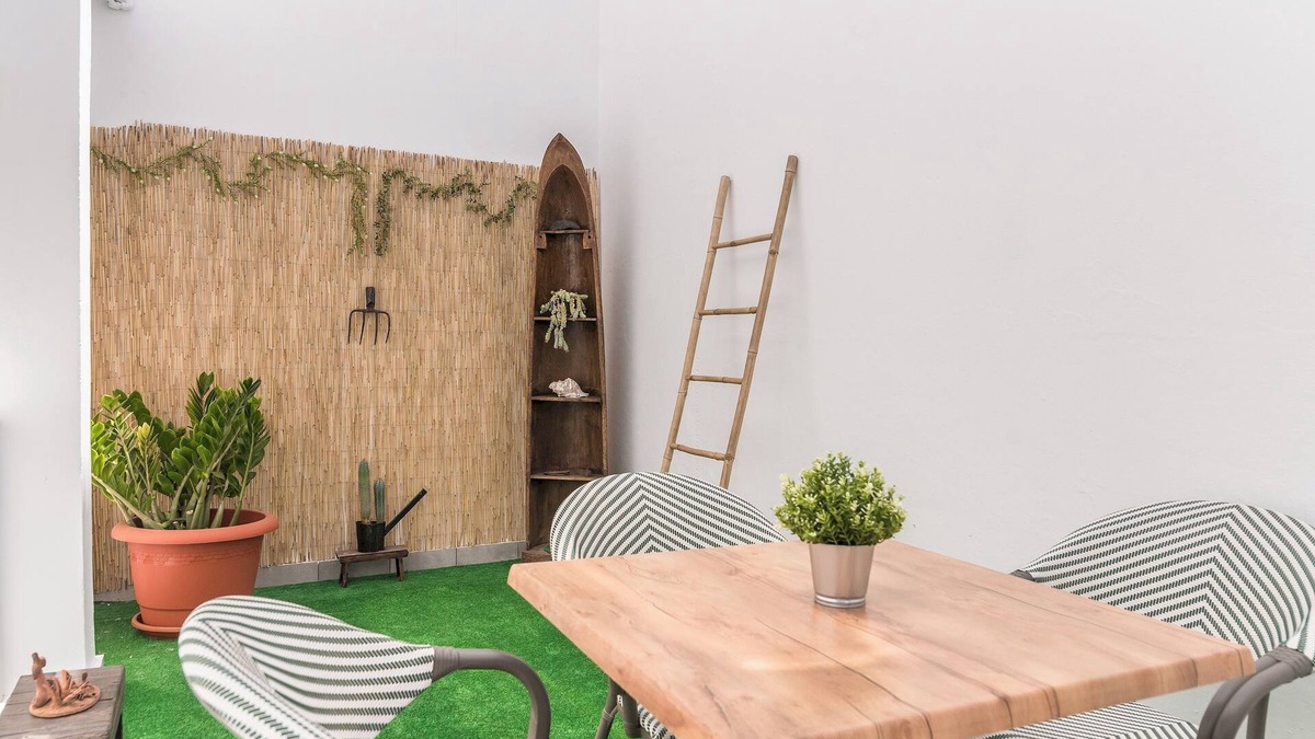 Vecindario Apartment | Home2Book Bright Retreat with Patio & Roof Access