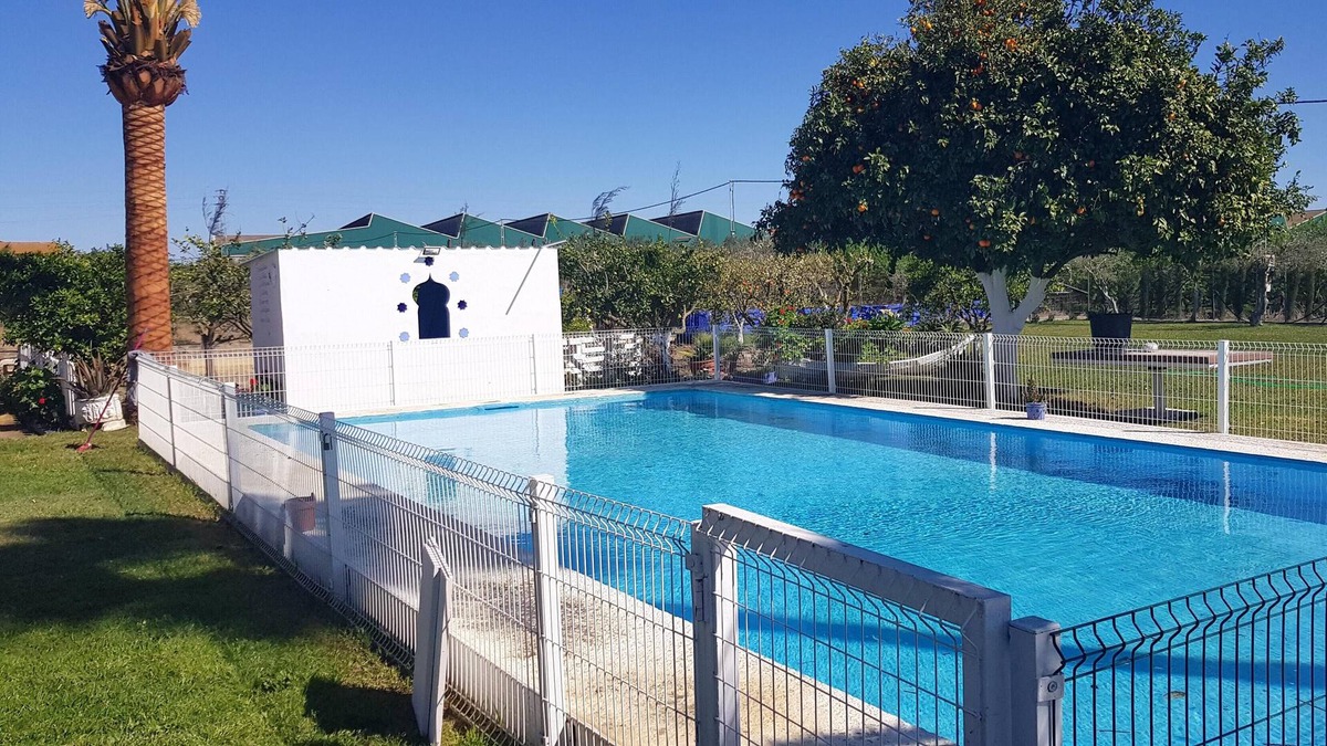 Utrera Ski Chalet | Homerez - Chalet for 14 ppl. with swimming-pool, garden and terrace at Utrera