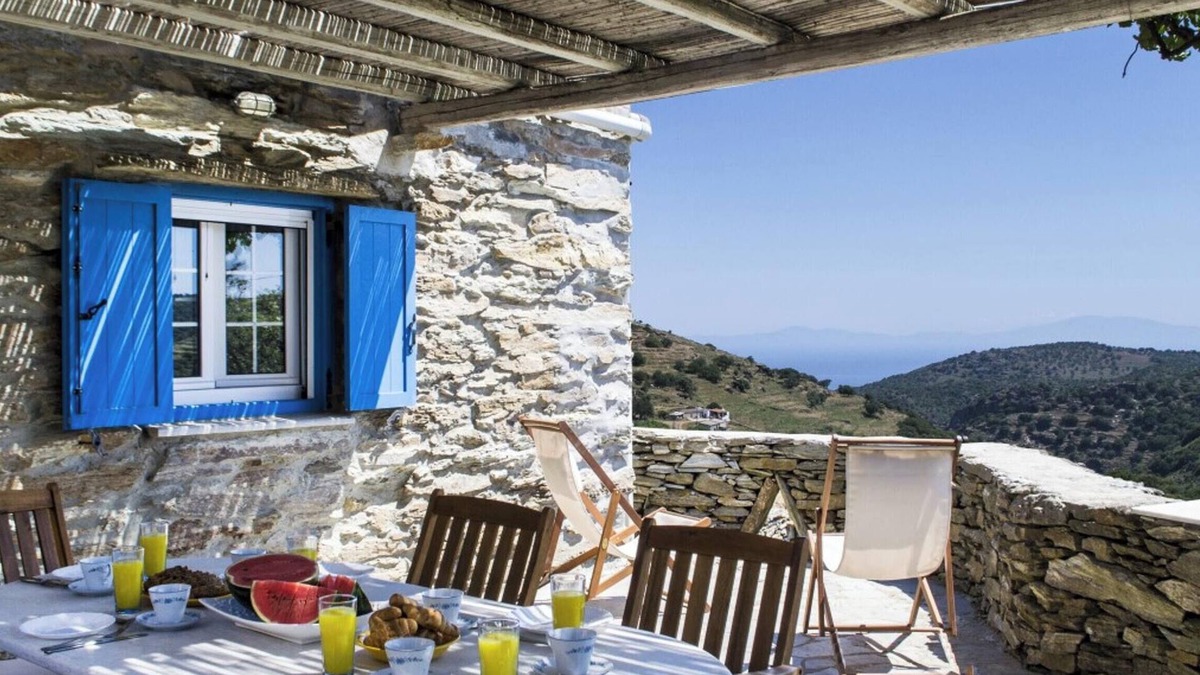 Ioulida House | Homerez - Charming House in Kastanies with Fireplace and View