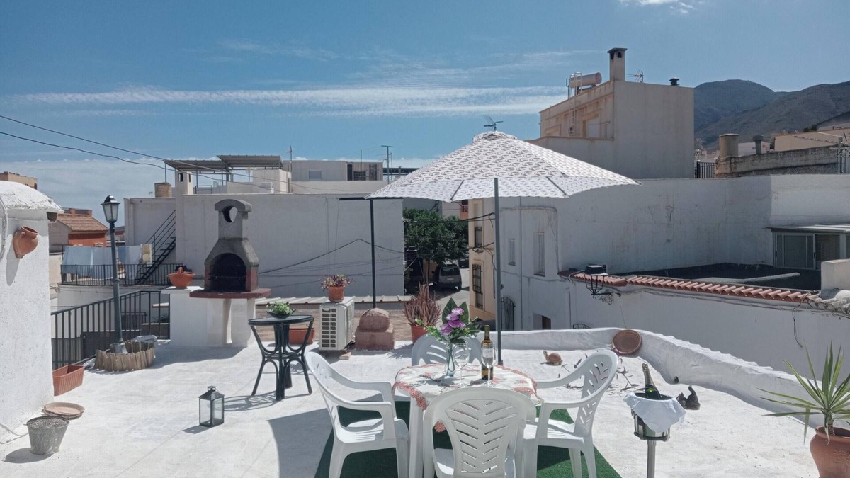 Illar House | Homerez - Charming House in Íllar with Mountain View and Balcony