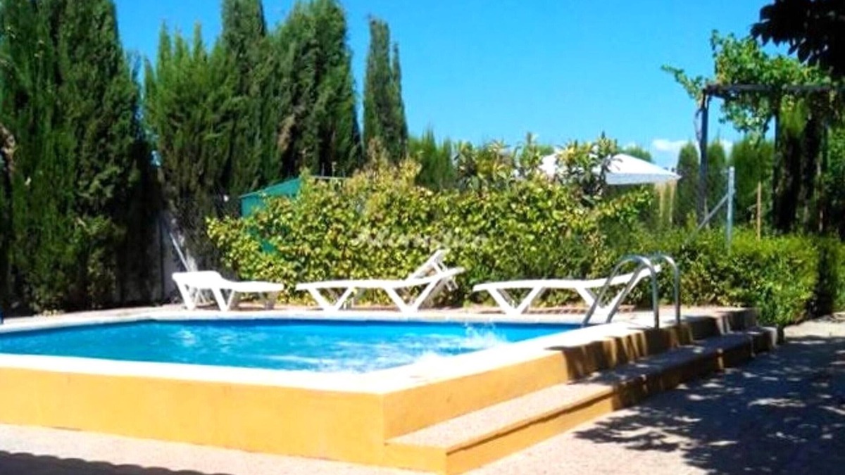 Chimeneas Villa | Homerez - Villa for 13 ppl. with swimming-pool, garden and terrace at Chimeneas
