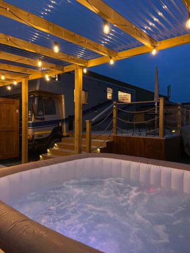 Ashbourne House | Horse Truck Tiny Home with Hot Tub
