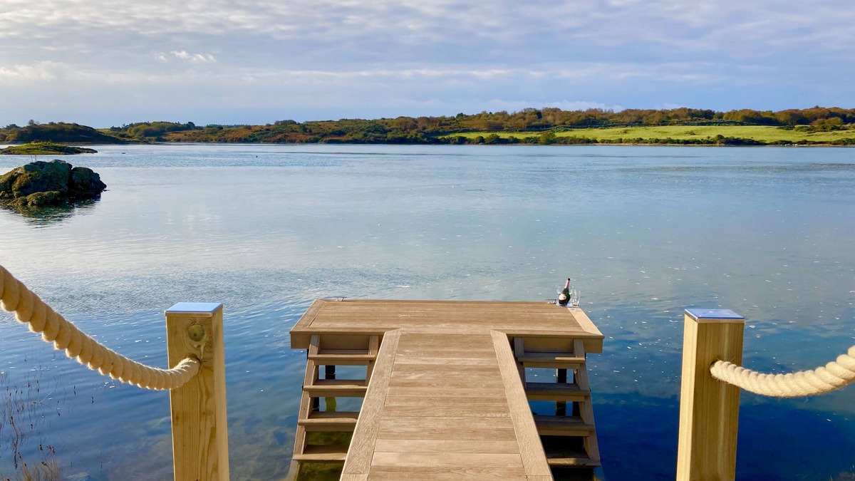 Caergeiliog Cottage | House on the Beach - an on the beach that sleeps 9 guests in 4 bedrooms