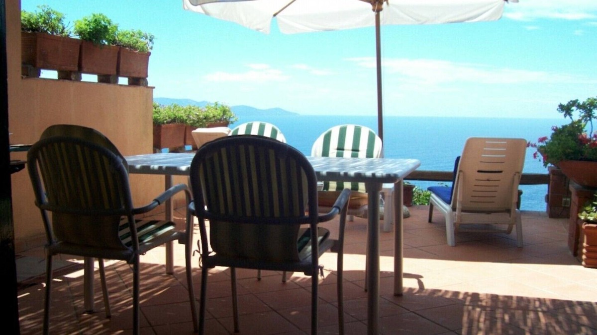 Cala Piccola Apartment | House with large terrace overlooking the sea, swimming pool, solarium, bathing establishment.