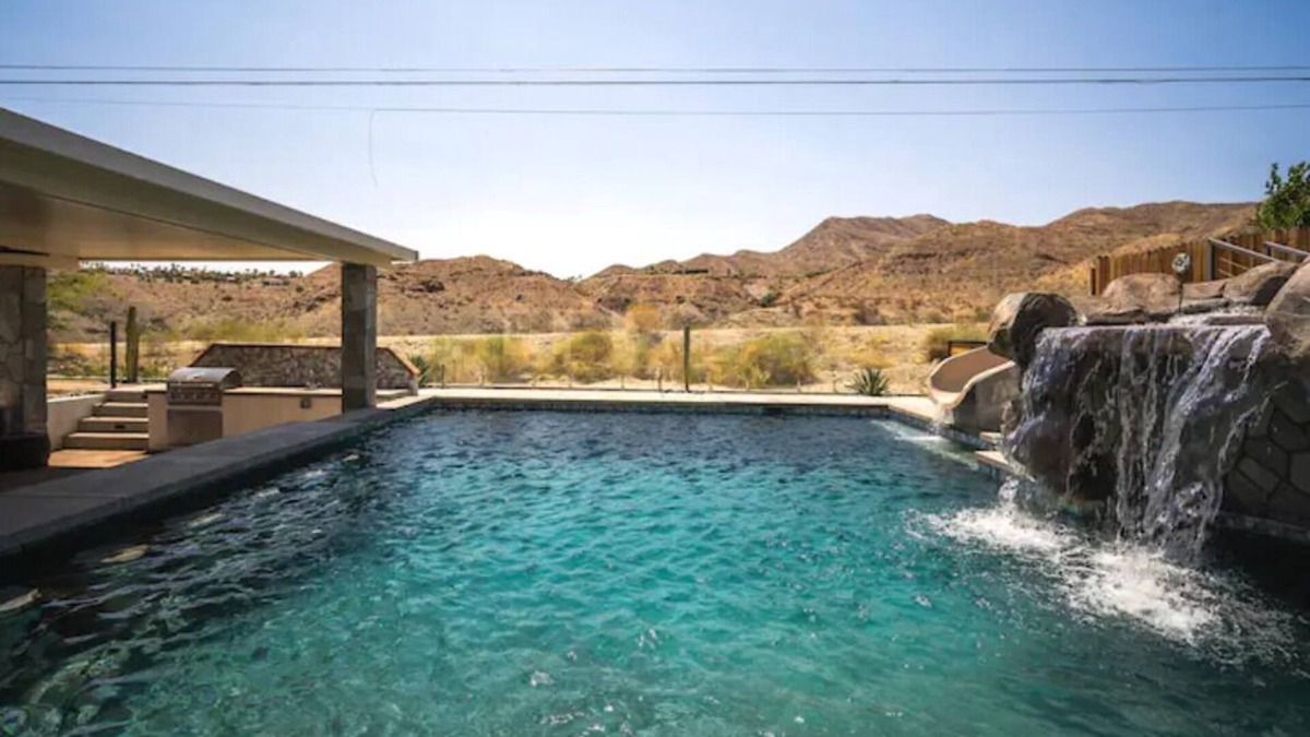 Cathedral City Cove House | Huge Home: Pool, Grotto, Water Slide, Swim Up Bar, Hot Tub, Fire Pit, Game Room