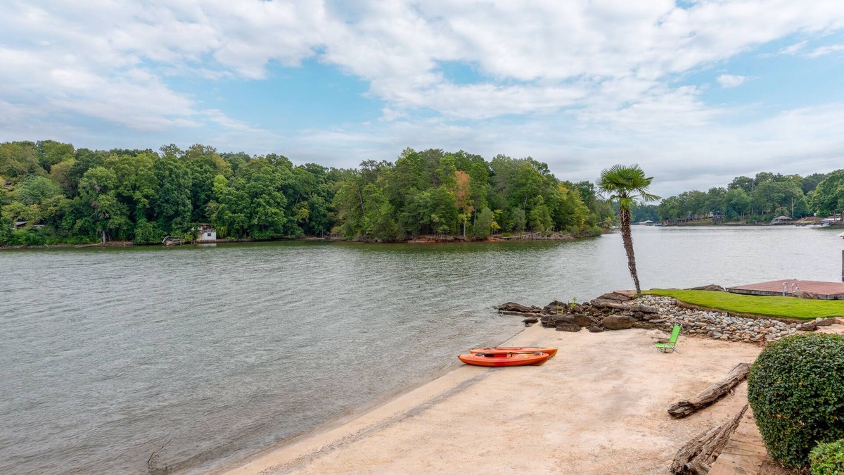 Steele Creek House | HUGE Lake Mansion w/Beach + 2 Great Rooms + Movie Thtr + Dock + Boat Avail